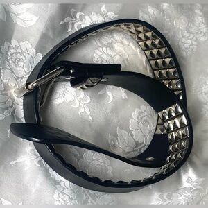 Black Faux Leather Accessory  Featuring Silver Pyramid Studs.   38 Inches Long